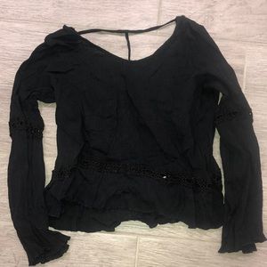 See-through black top with hole detail